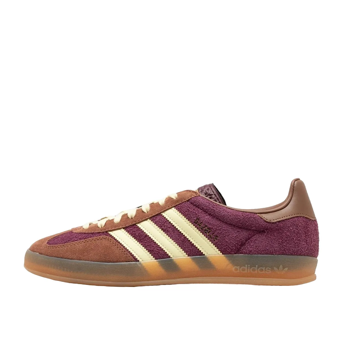 Adidas Gazelle Indoor sneakers, side view, model JI0324, in maroon with almost yellow accents.