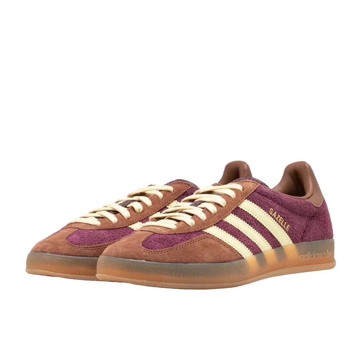 Adidas Gazelle Indoor sneakers, front view, model JI0324, in maroon with almost yellow accents.