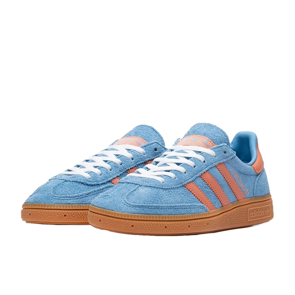 Adidas Handball Spezial Women's sneakers, front view, model IF6564, in light blue with wonder clay details.