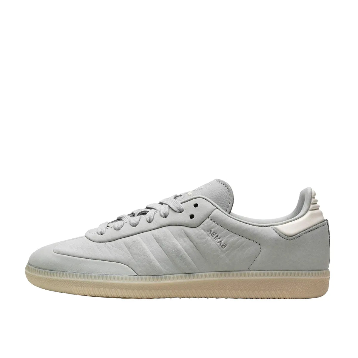 Adidas Samba Wonder Silver sneakers, side view, model IE4957, light silver with white and gum sole accents.