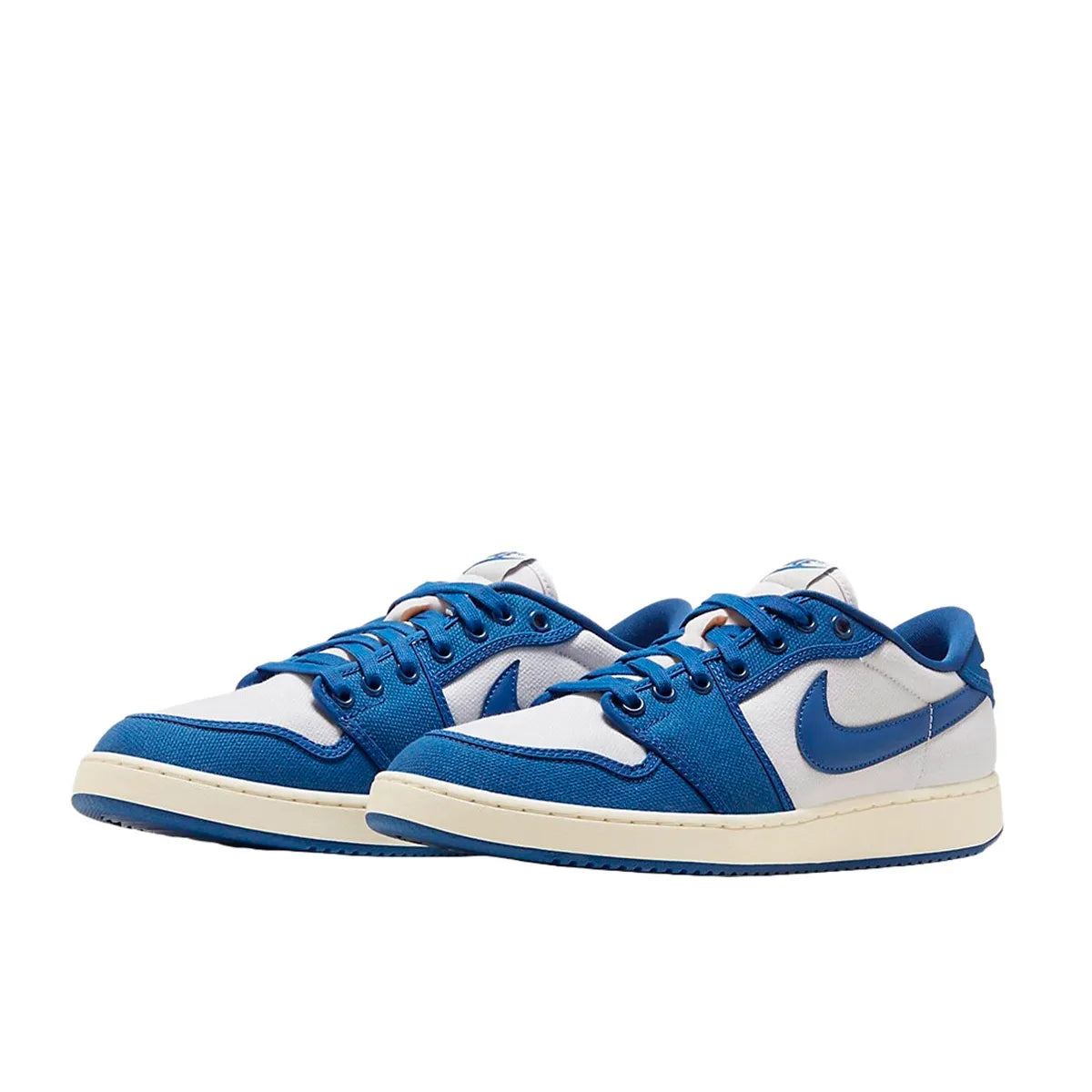 Air Jordan 1 Retro AJKO Low sneakers, front view, model DX4981-103, white and blue Kentucky colors.