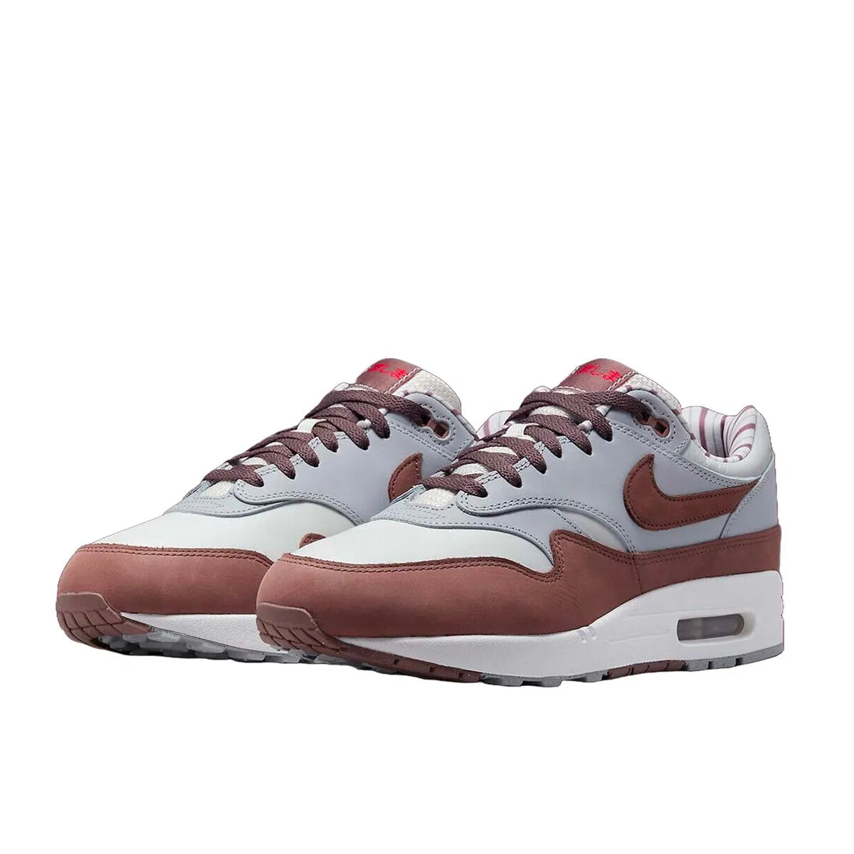 Nike Air Max 1 Premium Shima Shima 2023 sneakers, front view, model FB8916-100, brown with white and grey accents.