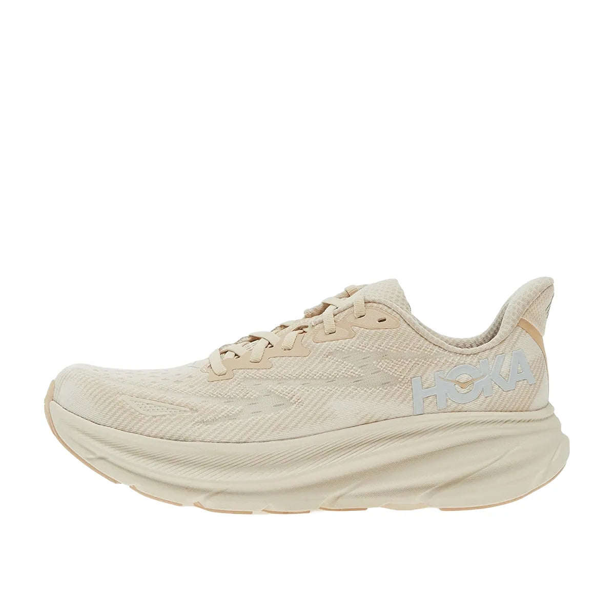 Hoka One One Clifton 9 sneakers for women, side view, model 1127896-SSEG, in shifting sand color with a comfortable fit.