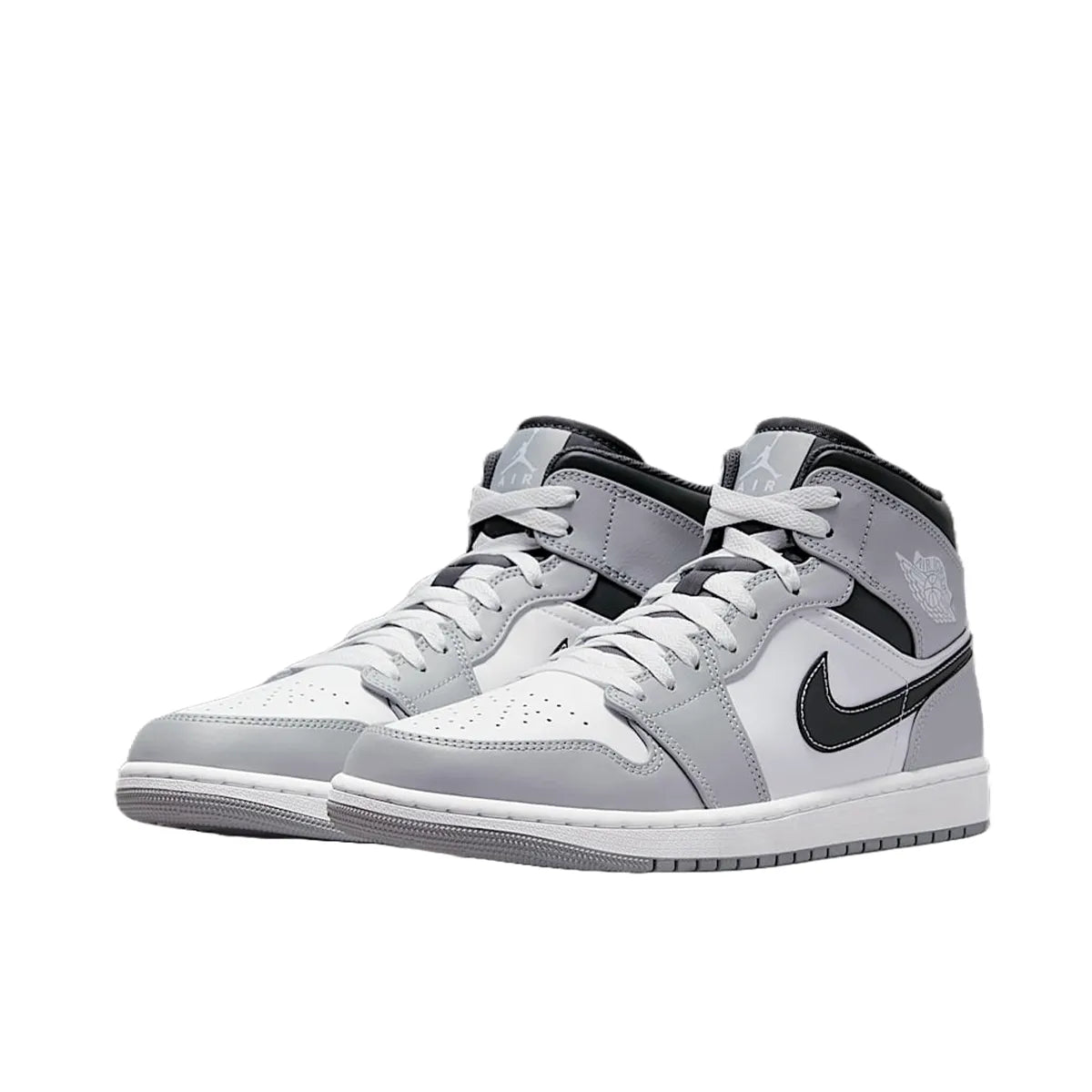 Jordan 1 Mid sneakers, front view, model 554724-078 in smoke grey with anthracite details.