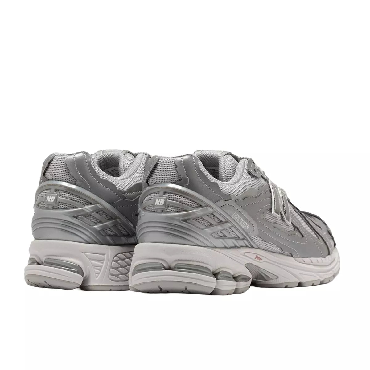 New Balance 1906D Protection Pack sneakers, back view, model M1906DH-1 in silver metallic with grey and white accents.