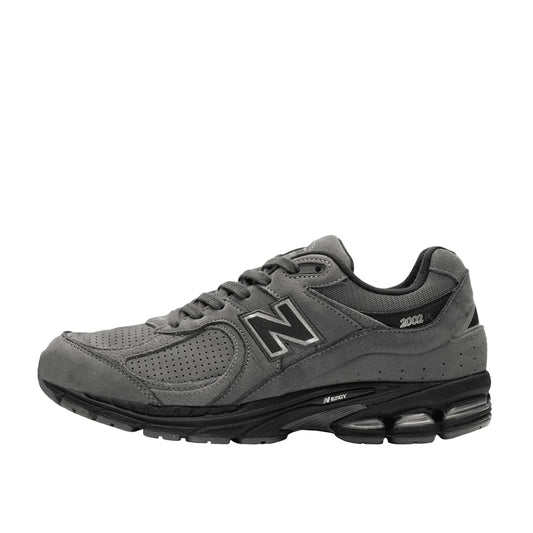 New Balance 2002R sneakers, side view, model M2002REH in castlerock with black details.