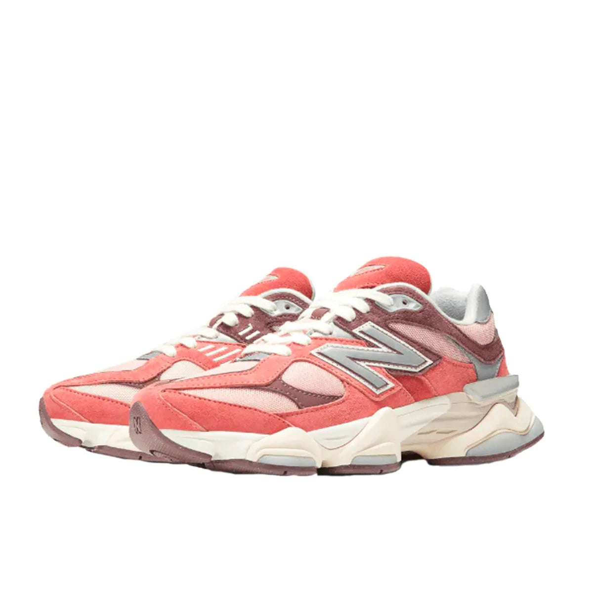 New Balance 9060 sneakers, front view, model U9060TRU in cherry blossom with beige and white details.