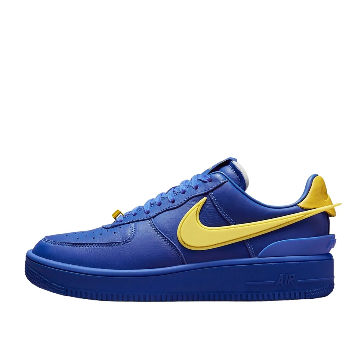 Nike Air Force 1 Low SP Ambush sneakers, side view, model DV3464-400, in game royal with yellow swoosh.