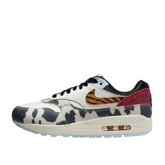 Nike Air Max 1 '87 Great Indoors Women's sneakers, side view, model FD0827-133, in cream with animal print details.