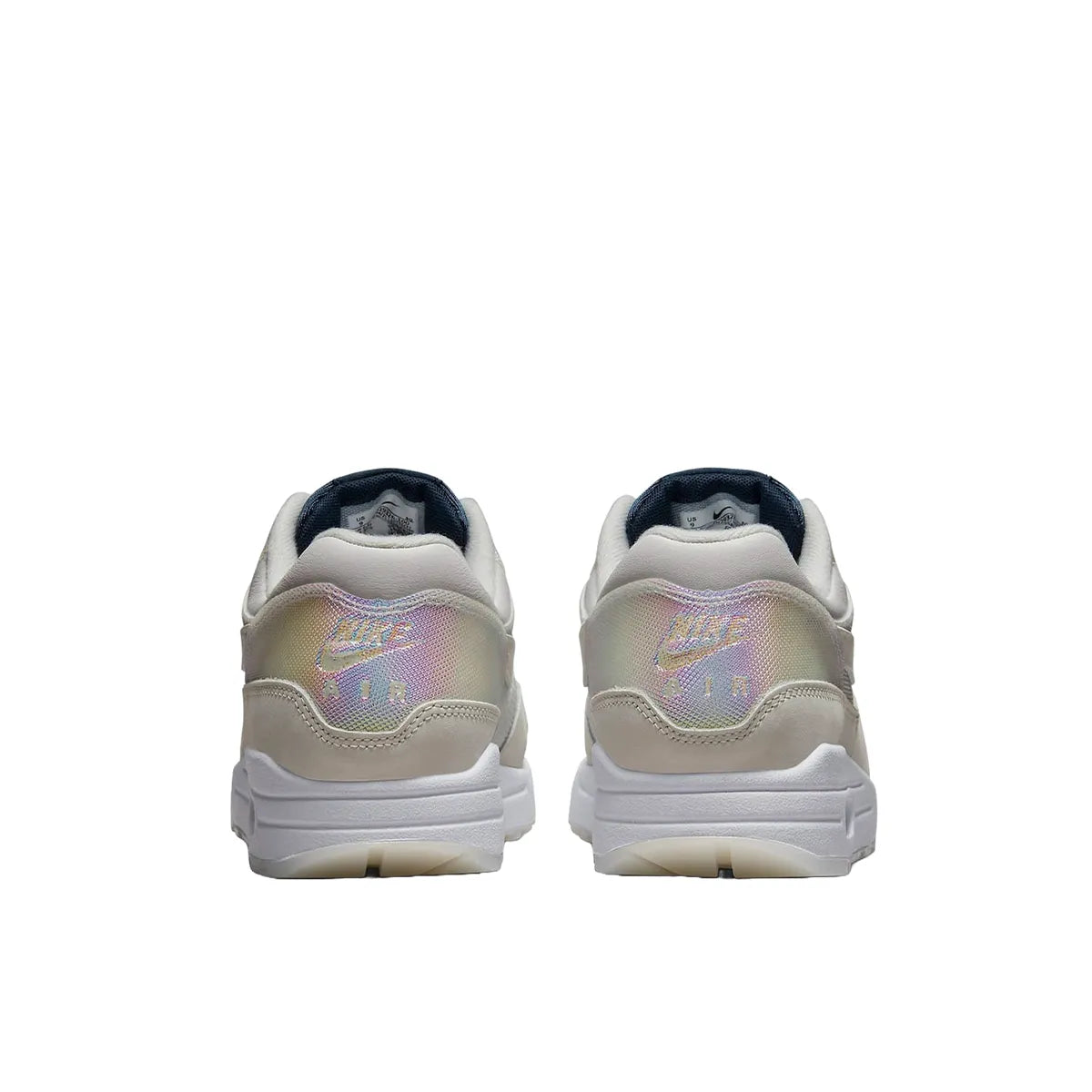 Nike Air Max 1 AMD La Ville Lumière Women's sneakers, back view, model DQ9326-100 in white with light accents.