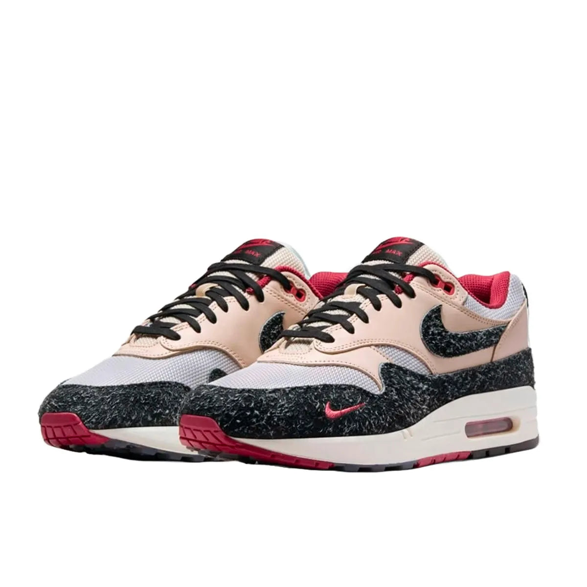 Nike Air Max 1 Keep Rippin Stop Slippin 2.0 sneakers, front view, model FD5743-200, black and beige with red accents.