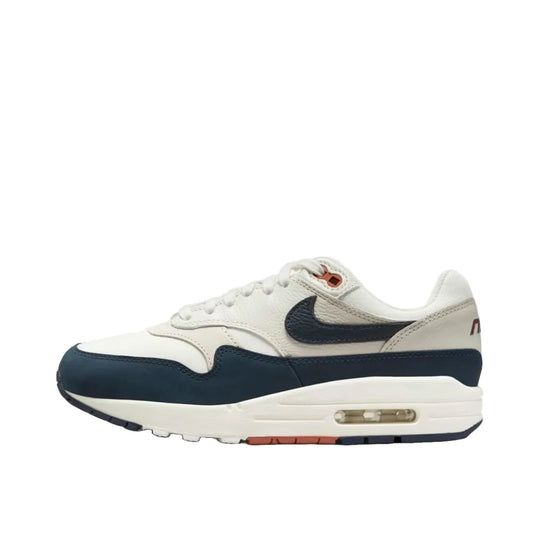 Nike Air Max 1 LX Obsidian Light Orewood Brown Women's sneakers, side view, model FD2370-110 in obsidian with light orewood brown accents.