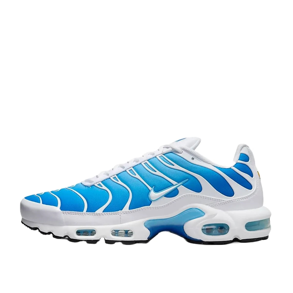 Nike Air Max Plus sneakers, side view, model 852630-411, in sky blue with black accents.