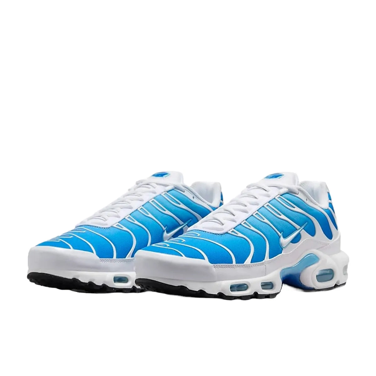 Nike Air Max Plus sneakers, front view, model 852630-411, in sky blue with black accents.