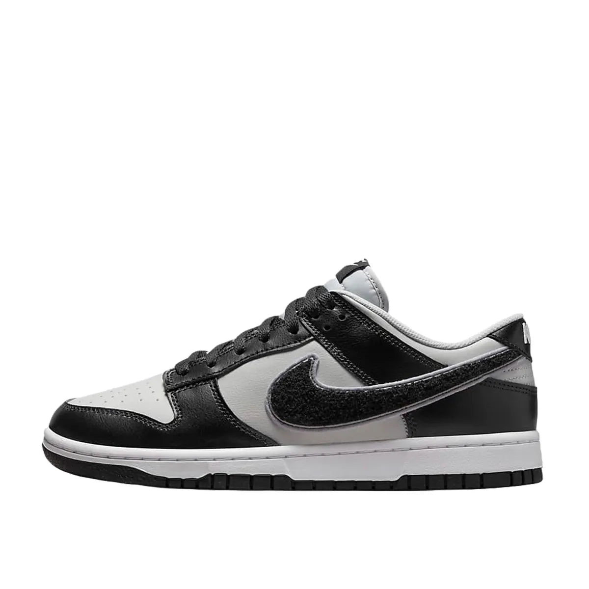 Nike Dunk Low Chenille Swoosh sneakers, side view, model DQ7683-001 in black and grey.