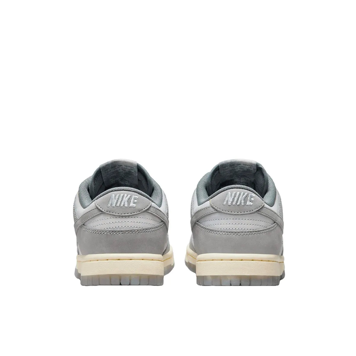 Nike Dunk Low Women's sneakers, back view, model FV1167-001, in cool grey with grey accents.