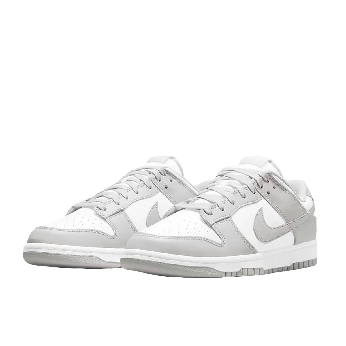 Nike Dunk Low sneakers in Grey Fog, front view, model DD1391-103 in grey and white.