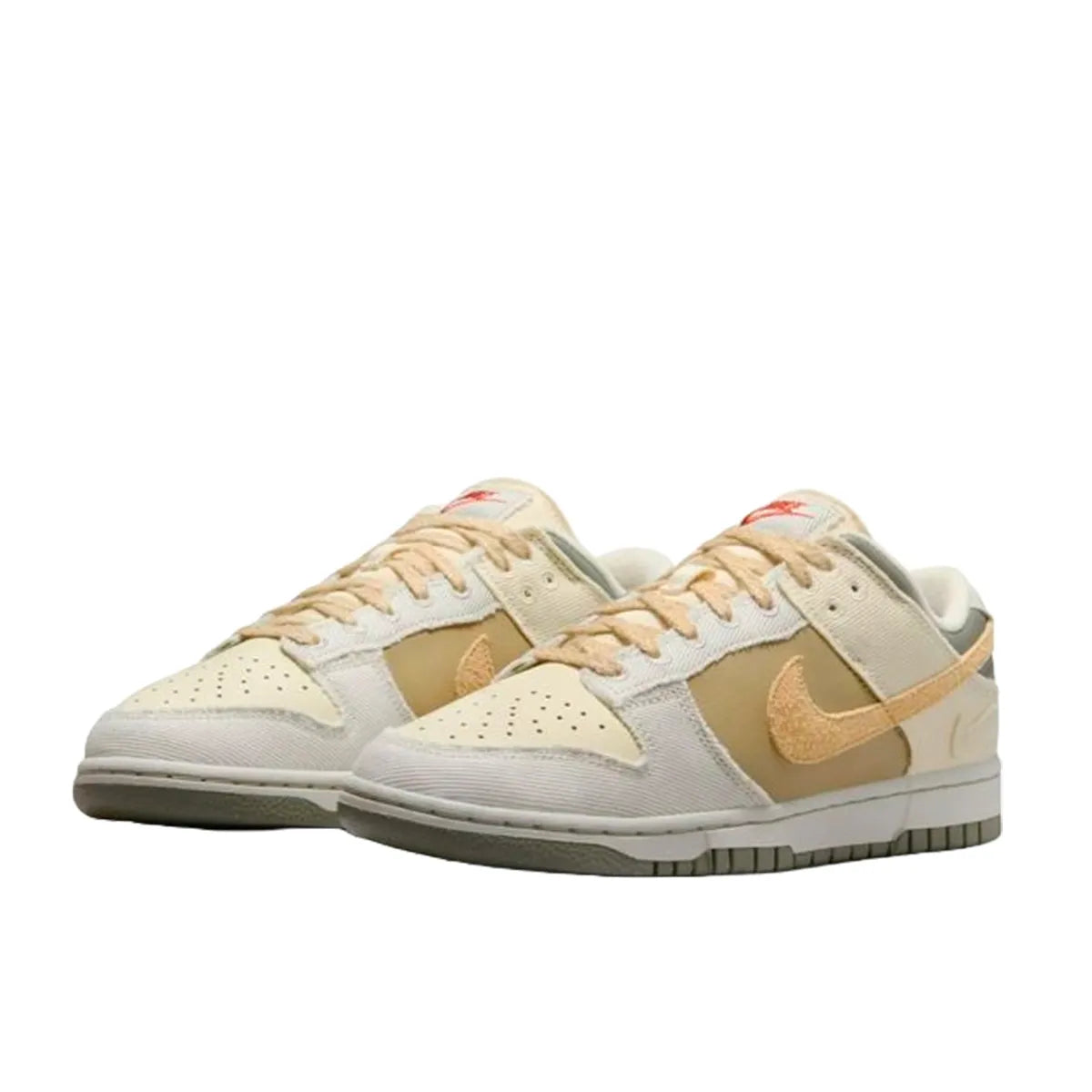 Nike Dunk Low Women's sneakers, front view, model FZ4341-100, in light bone with dark stucco and white accents.