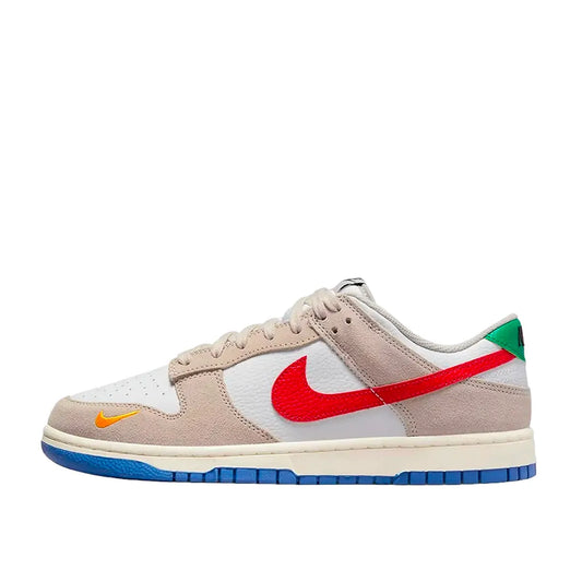 Nike Dunk Low sneakers, side view, model DV3497-001 in light iron ore with red and blue details.