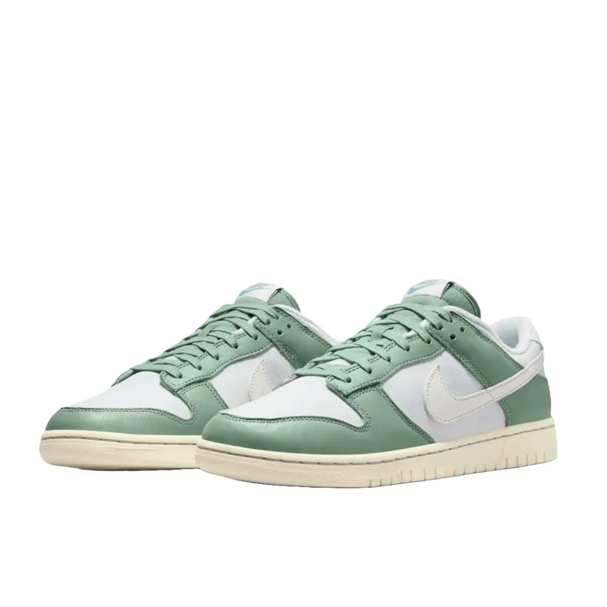 Nike Dunk Low sneakers, front view, model DV7212-300 in mica green with white and grey details.