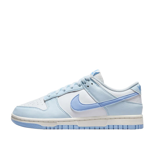 Nike Dunk Low Next Nature Women's sneakers, side view, model DD1873-400, in blue tint with a sleek finish.