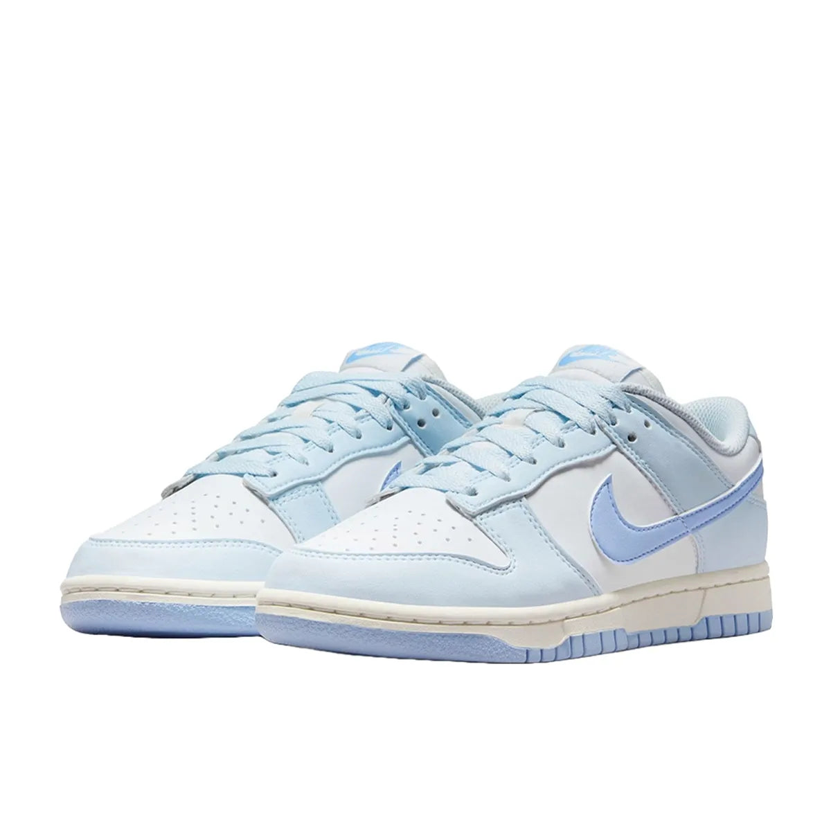 Nike Dunk Low Next Nature Women's sneakers, front view, model DD1873-400, in blue tint with a sleek finish.