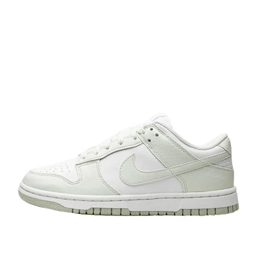 Nike Dunk Low Next Nature Women's sneakers, side view, model DN1431-102 in white with mint green details.