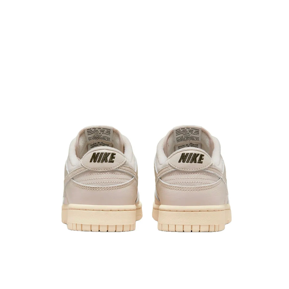 Nike Dunk Low Premium sneakers, back view, model DZ2538-100, in light orewood brown with white and beige accents.