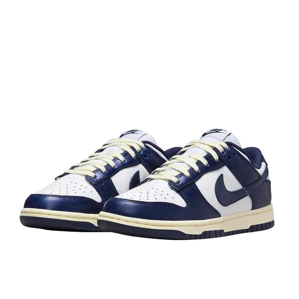 Nike Dunk Low PRM Women's sneakers, front view, model FN7197-100, in vintage navy with white accents.