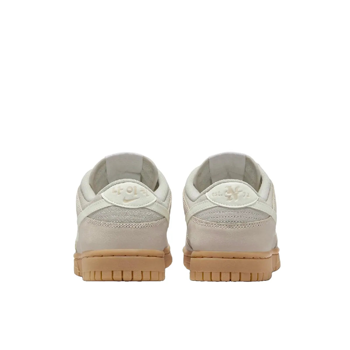 Nike Dunk Low SE Hangul Day Women's sneakers, back view, model FQ8147-104 in beige with gum sole and white details.