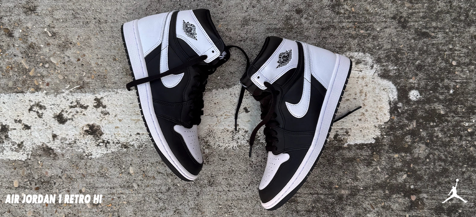 Refine your look with the Air Jordan 1 Retro Hi OG in a stylish black and white combination.