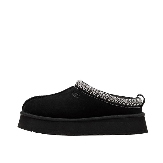 UGG Tazz Women's Slipper, side view, model 1122553-BLK, featuring a black upper with a platform sole.